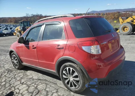 2010 Suzuki Sx4 z USA, uszkodzony, nr VIN JS2YB5A38A6310078